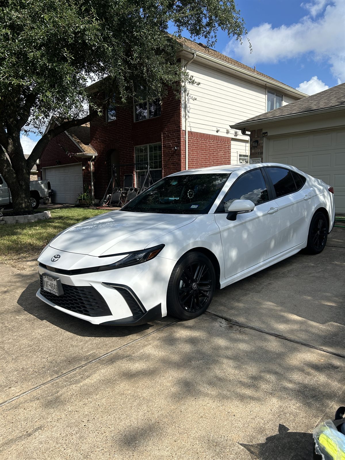 Toyota Camry after a full exterior detail in a Katy, TX driveway